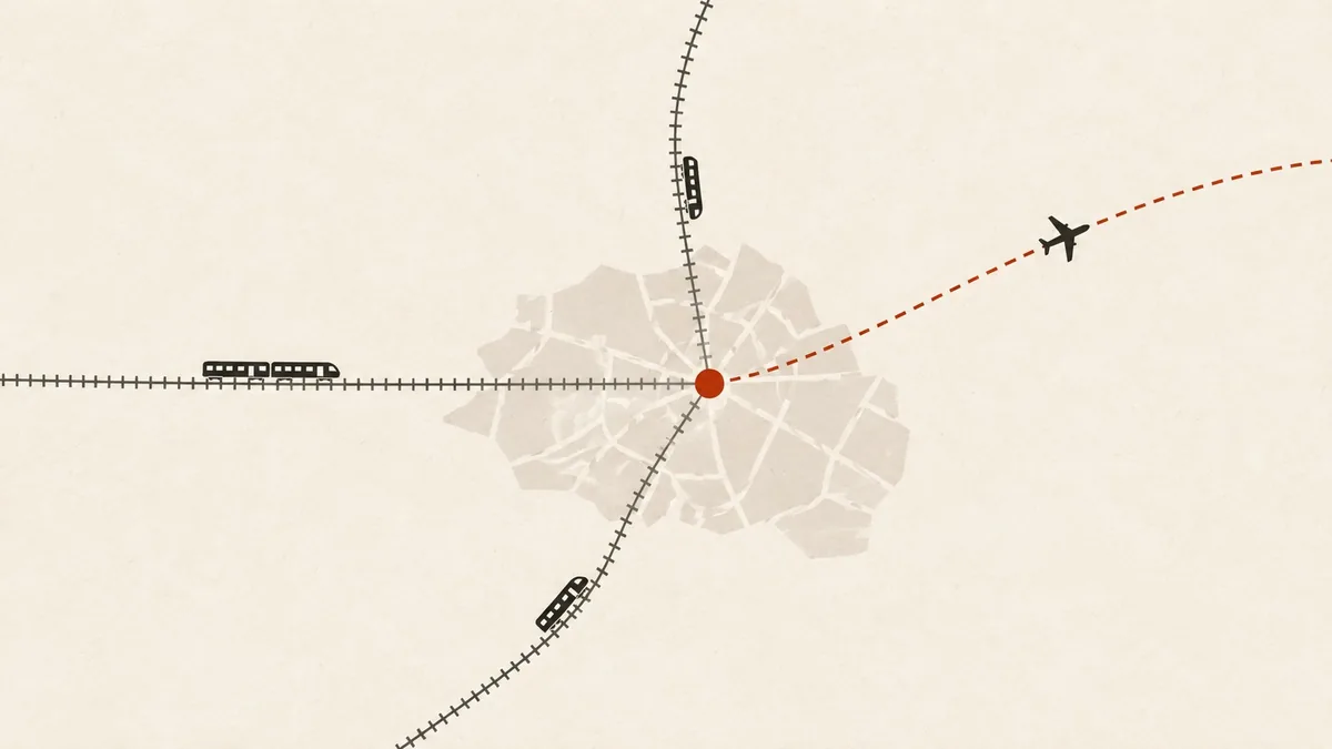 Illustration of rail lines and a flight path converging on the city from several directions.